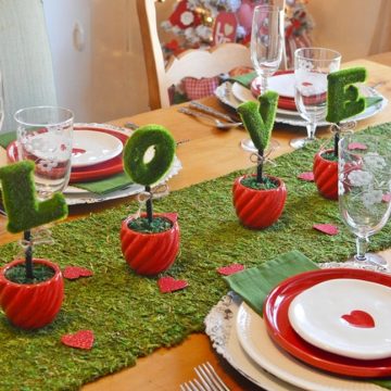 Valentine's day tablescape with moss covered letters
