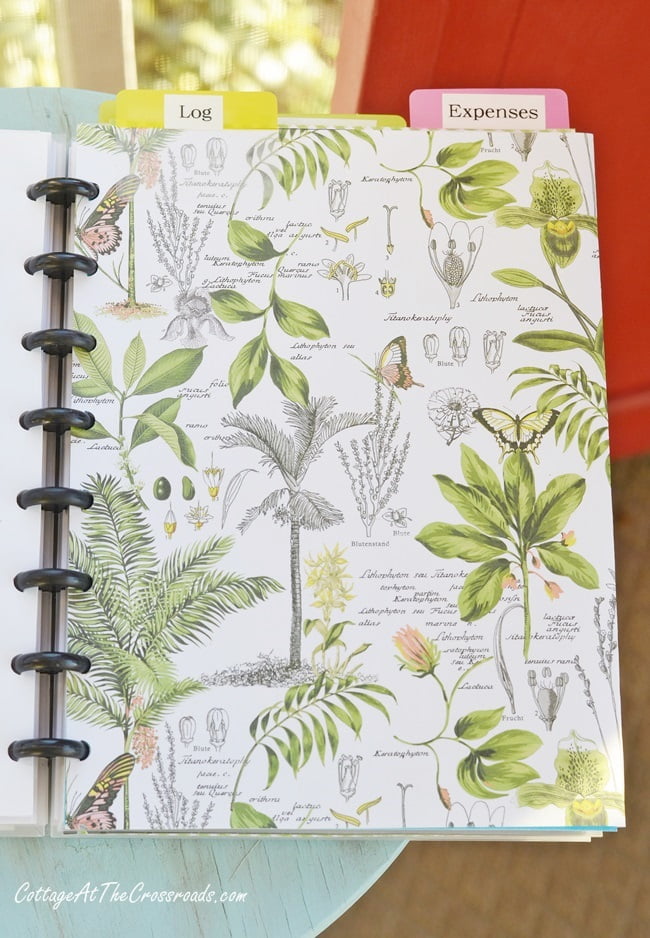 Running log divider page in a garden journal
