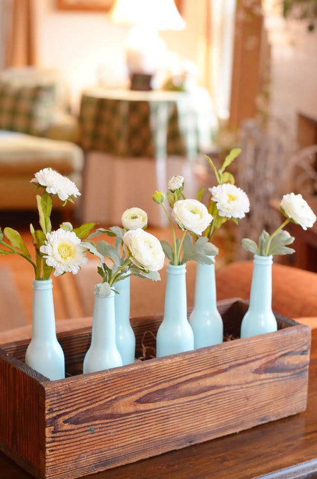 Aqua painted bottle spring centerpiece