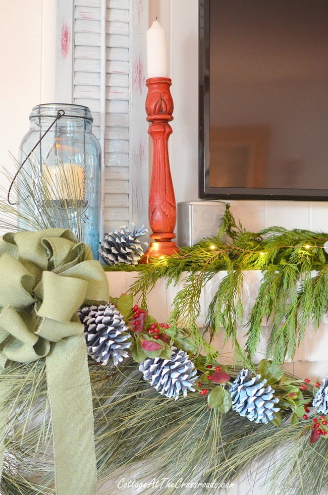 Blue wooden shutters on a christmas mantel