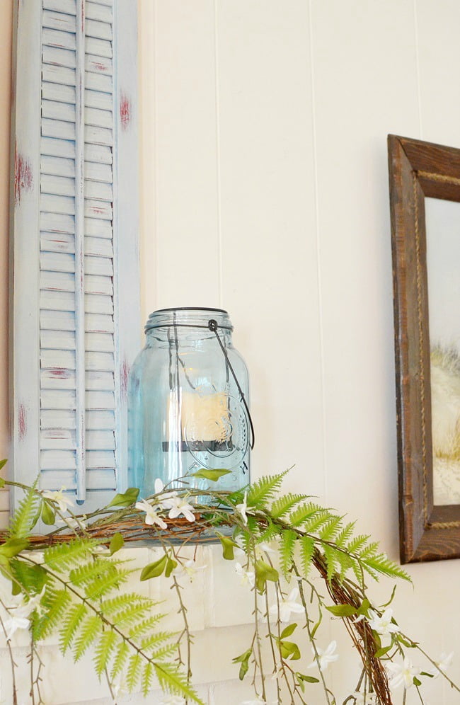 Decorating with a blue painted wooden shutter