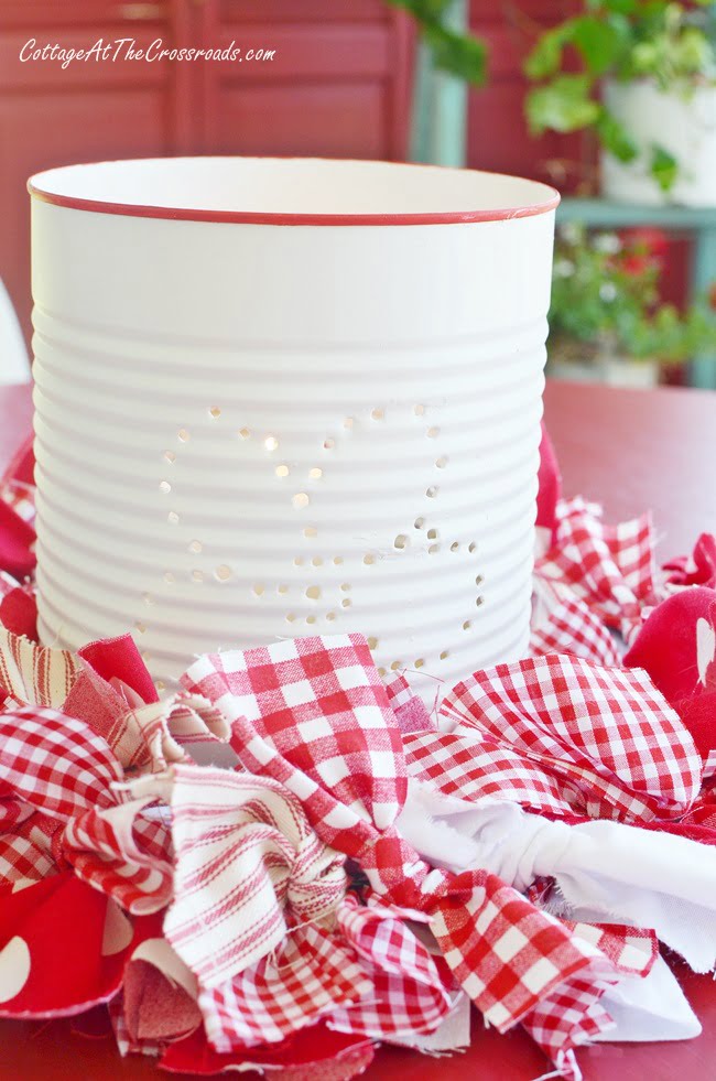 Punched tin can lanterns