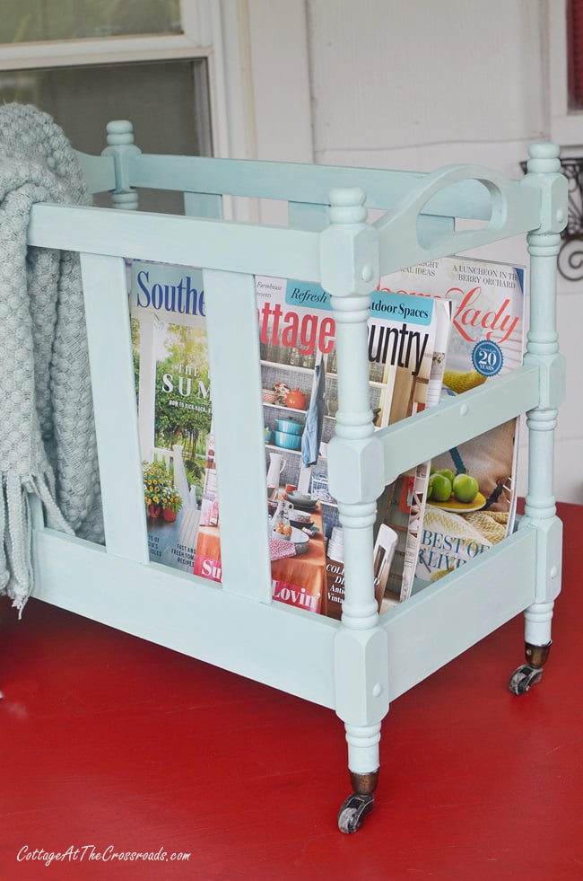 Side view of the upcycled vintage magazine rack