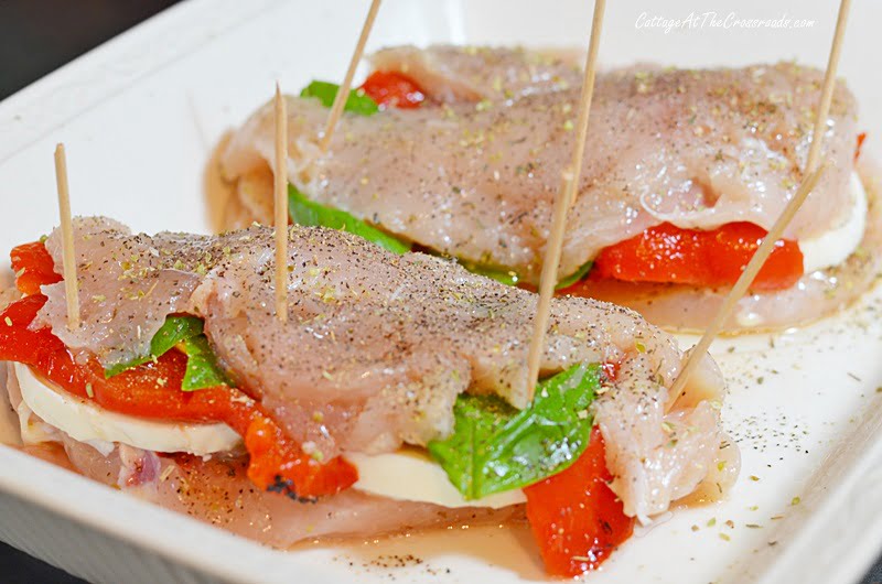 Stuffed chicken breasts secured with toothpicks