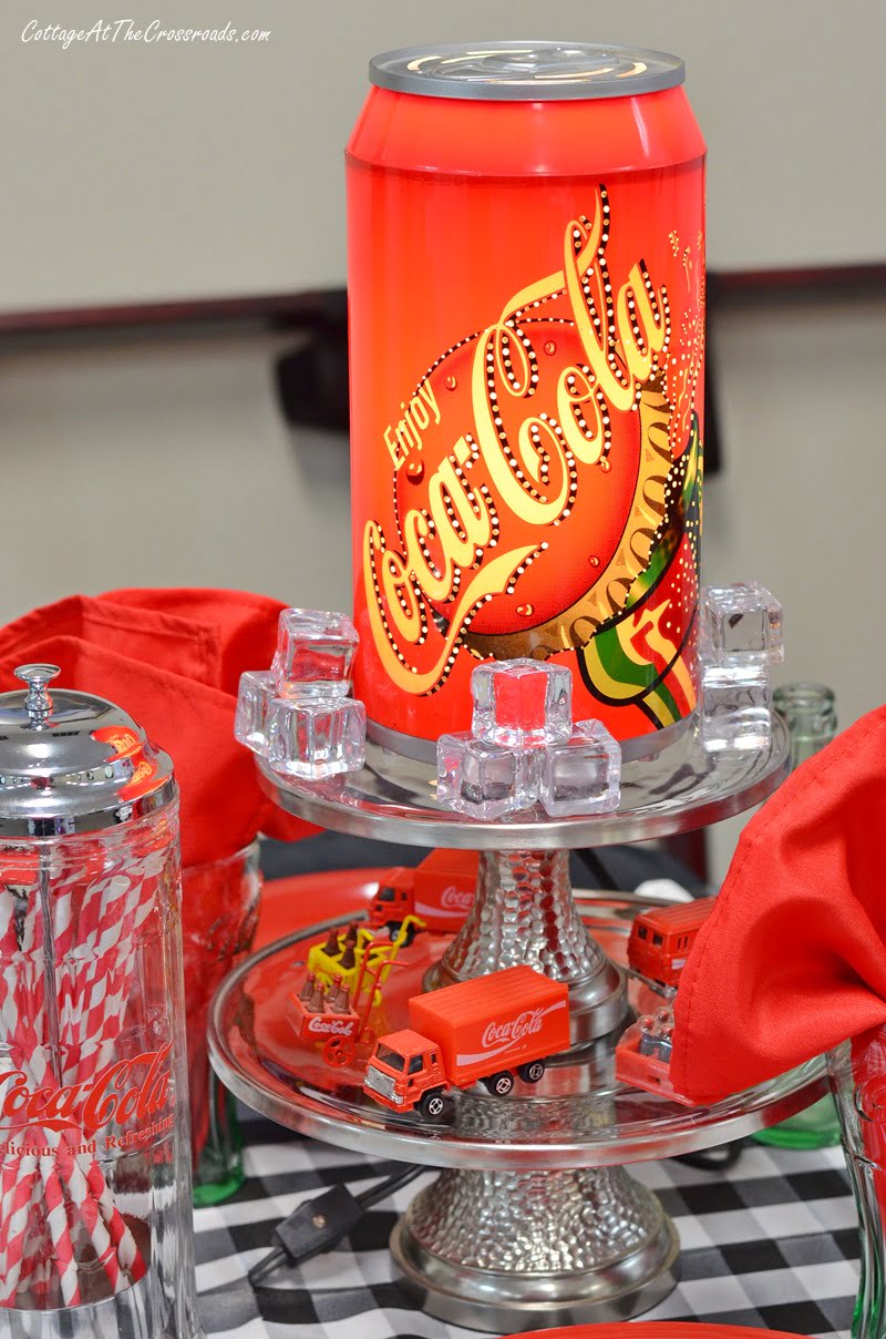 Rotating lighted coca-cola lamp