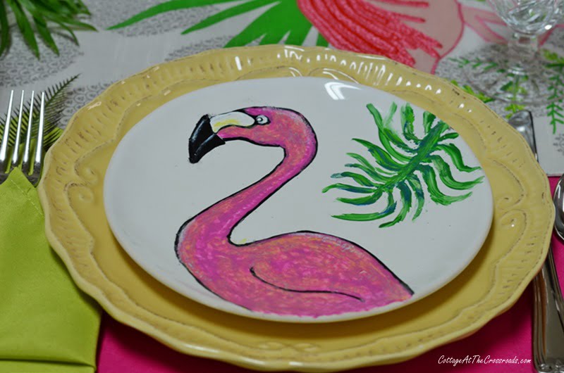 Painted flamingo plates used in a tablescape