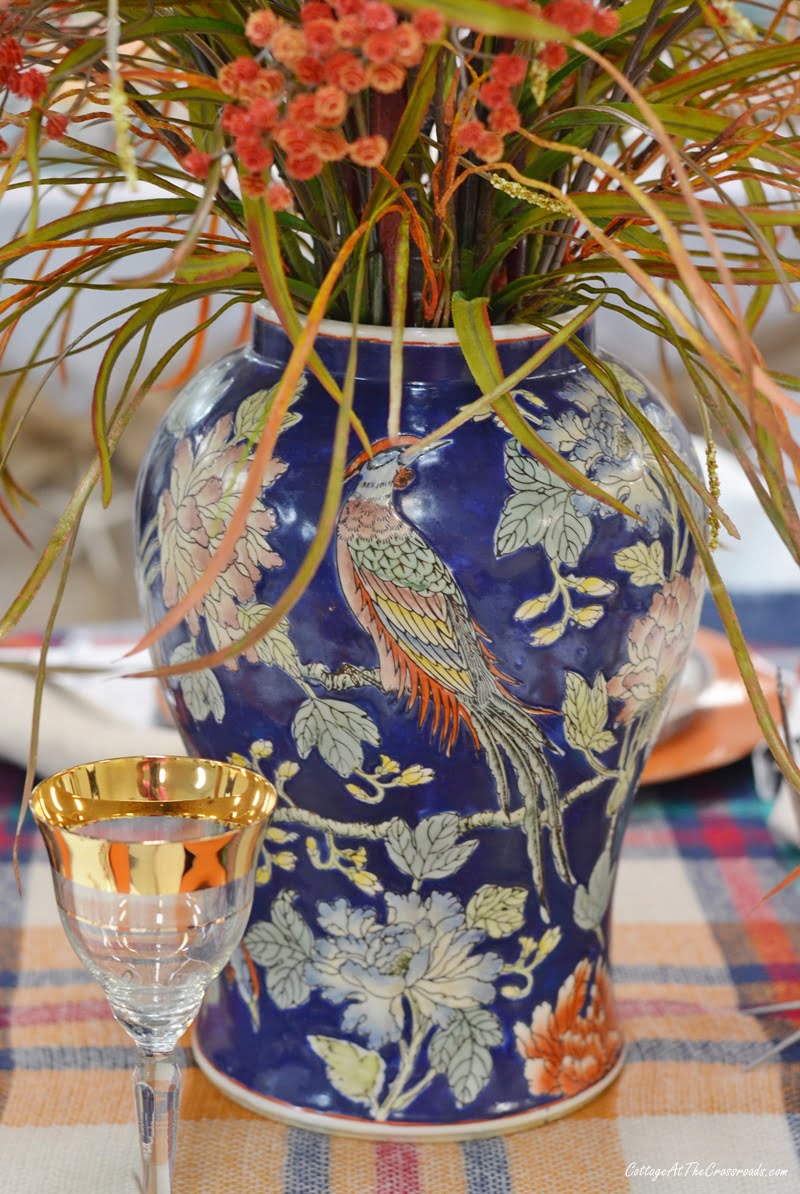 Vase with pheasant used on a fall tablescape