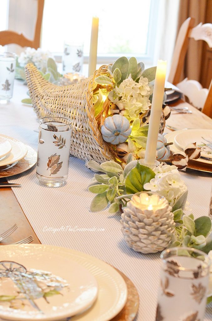 Thanksgiving tablescape with a cornucopia centerpiece