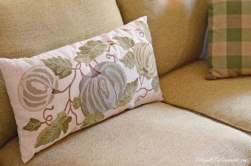 Fall pillow with a blue pumpkin