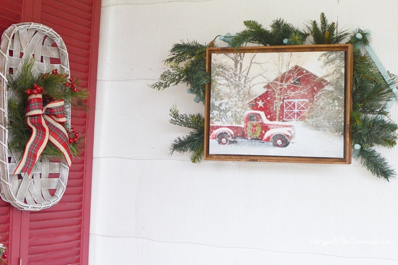 Red barn and red truck piece of artwork