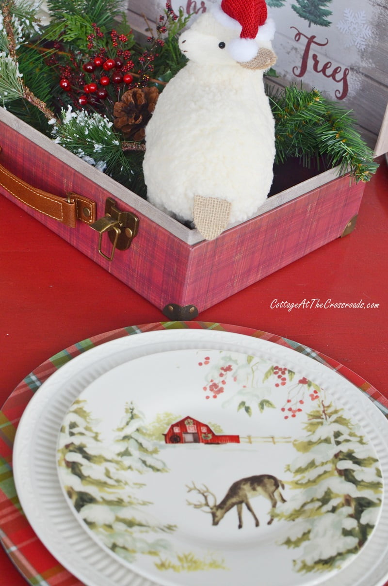 Red barn plates on a christmas table