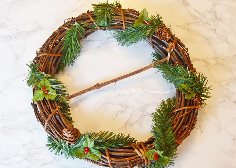 Small, old grapevine wreath used to make an ornament wreath