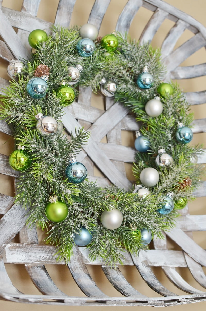 Christmas ornament wreath in a tobacco basket