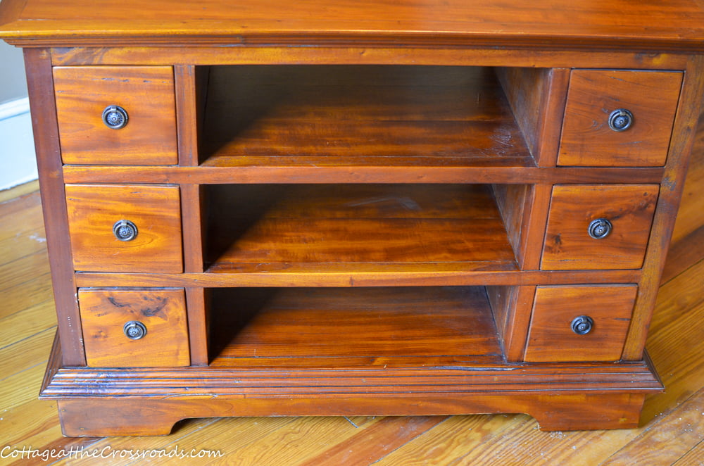 Old media cabinet transformed into a repurposed vanity