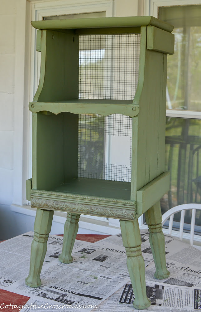 Green painted cottage style magazine rack