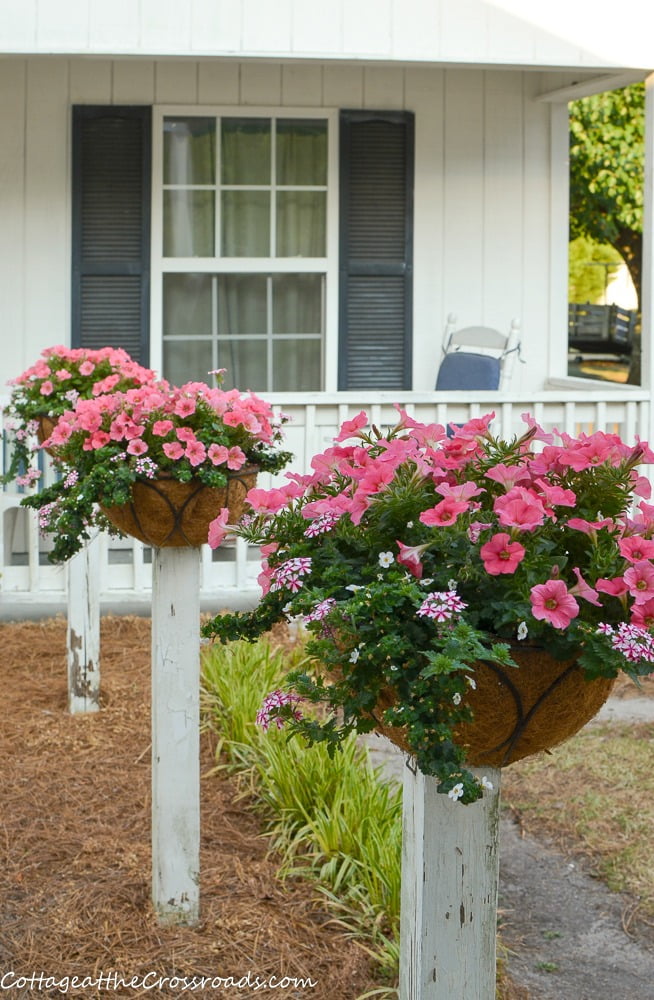 Flower baskets on posts