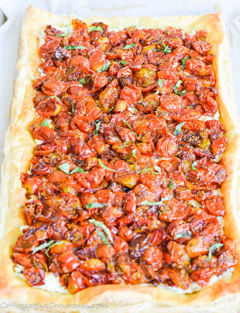 Roasted cherry tomato tart with herbed goat cheese