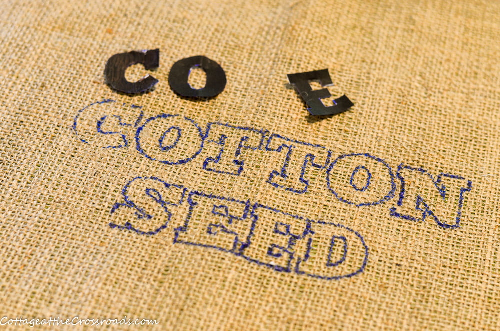 Stencil letters for the words cotton seed