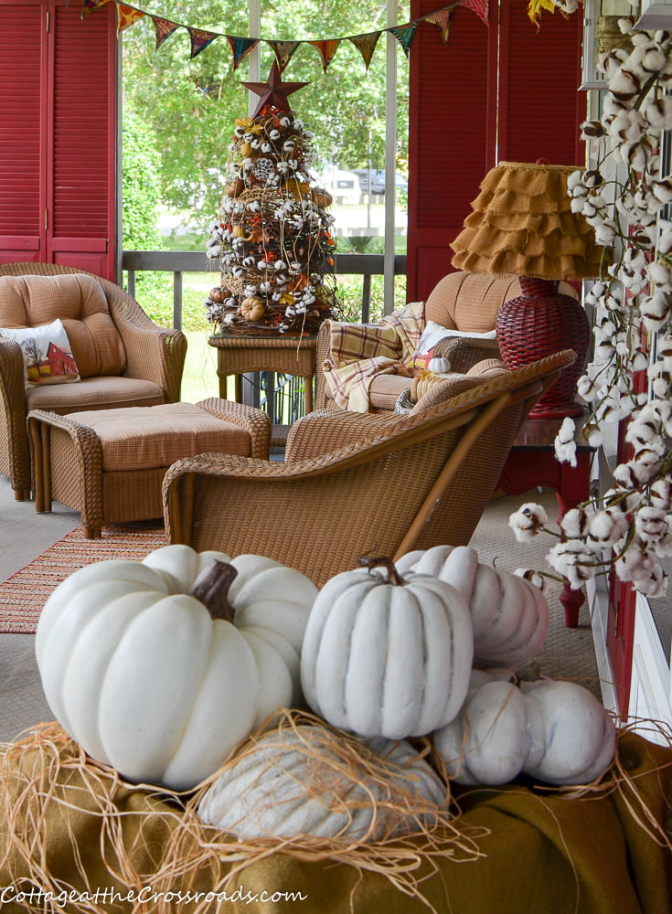 Fall front porch decorated with a cotton theme