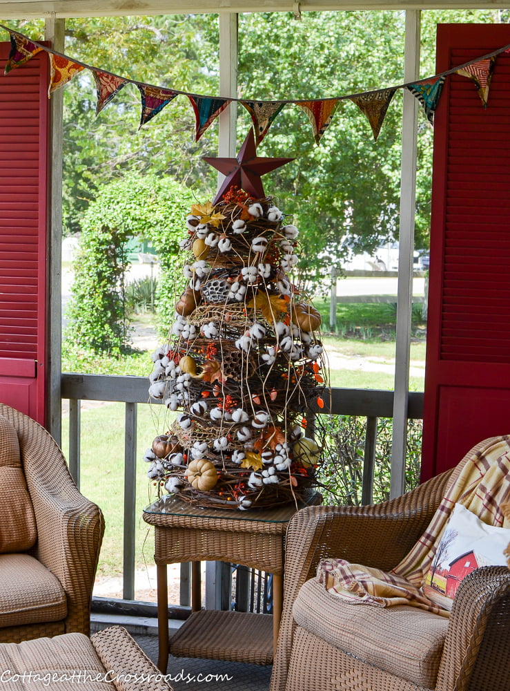 Kantha cloth bunting on a fall porch