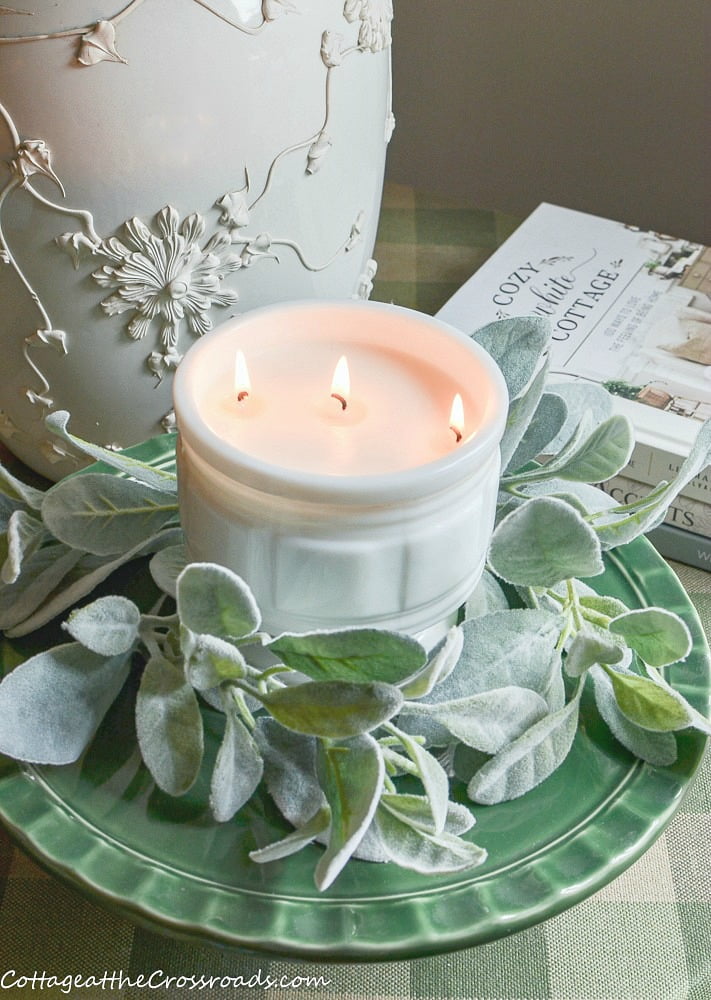 Homemade candle in a vintage milkglass container