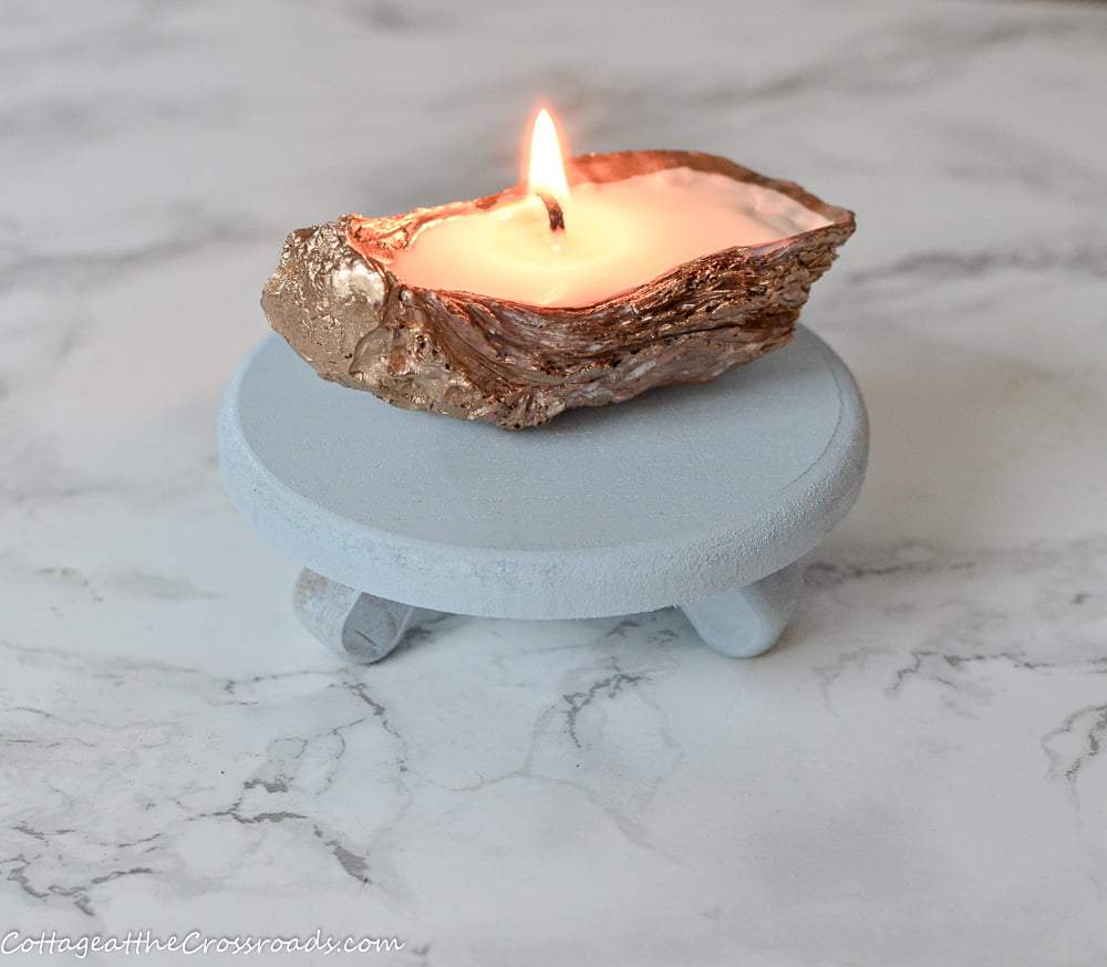 https://cottageatthecrossroads.com/wp-content/uploads/2019/10/oyster-shell-homemade-candle.jpg