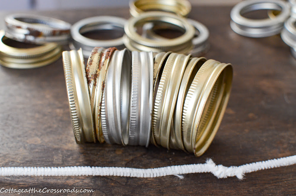 Canning rings and a long pipecleaner