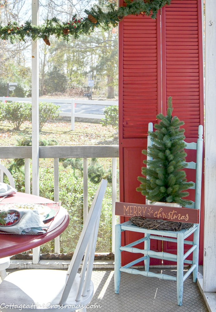 Christmas tree in an aqua chair