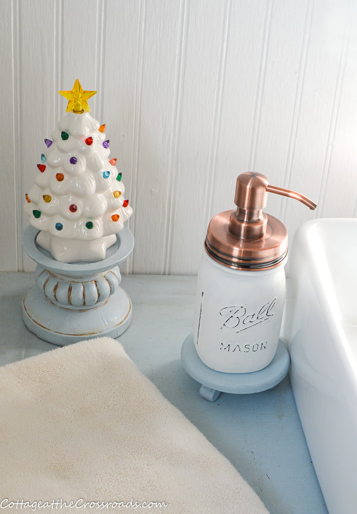 White ceramic tree in christmas bathroom