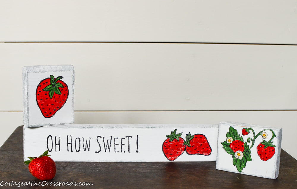 Scrap wood signs with strawberries