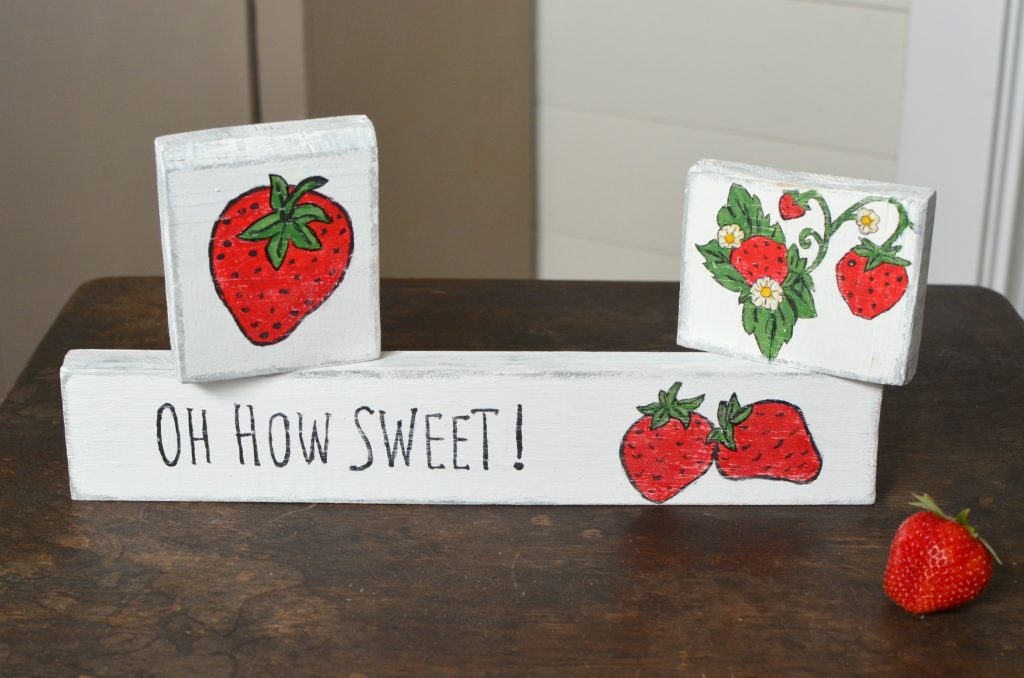 Scrap wood signs with strawberries