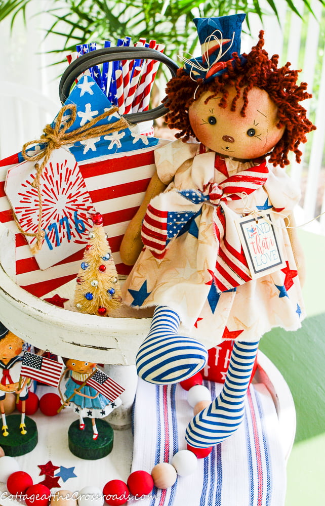 Miss liberty doll on a patriotic tiered tray
