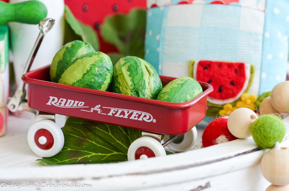Diy watermelons in a red wagon
