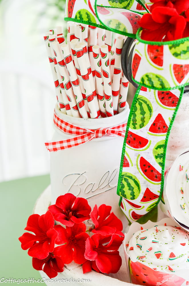 Watermelon straws on a tiered tray