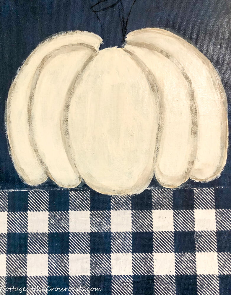 Painting a white pumpkin