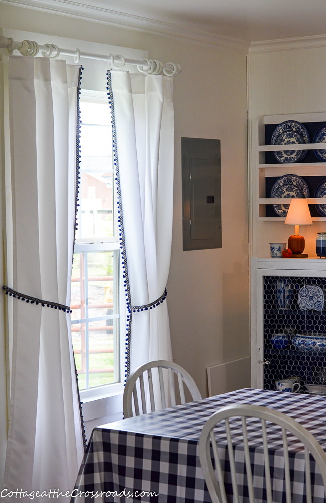 Table and curtains in craft studio