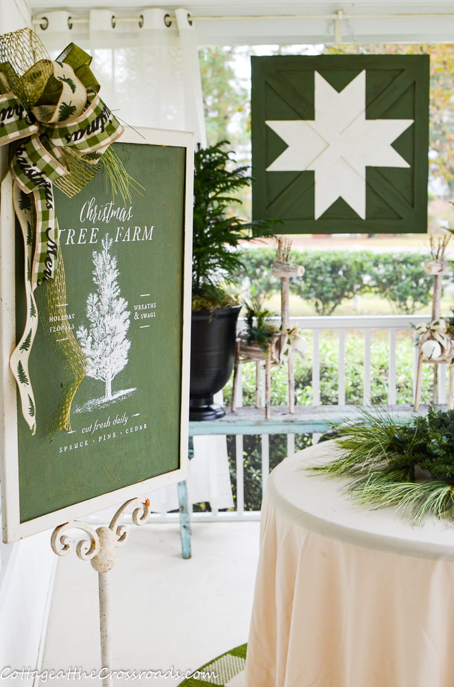 Christmas front porch decorated in green