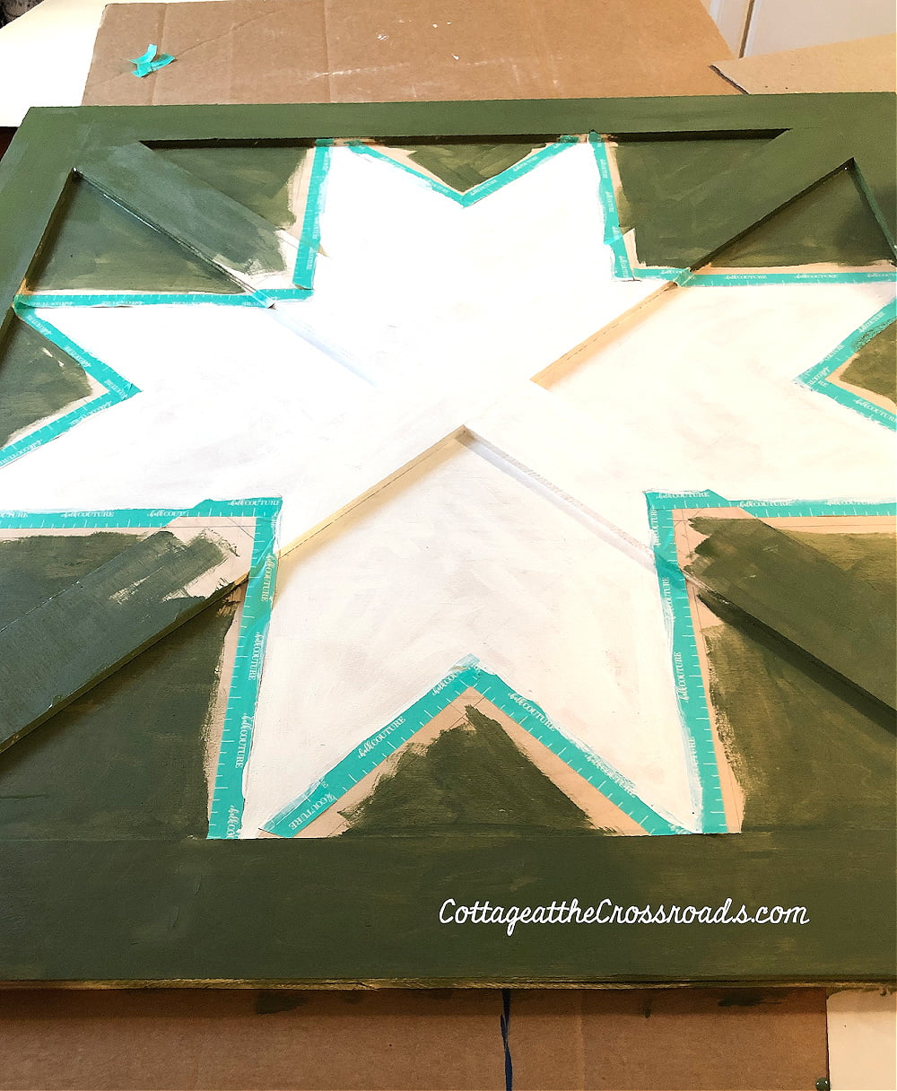 Painting a wooden barn star quilt