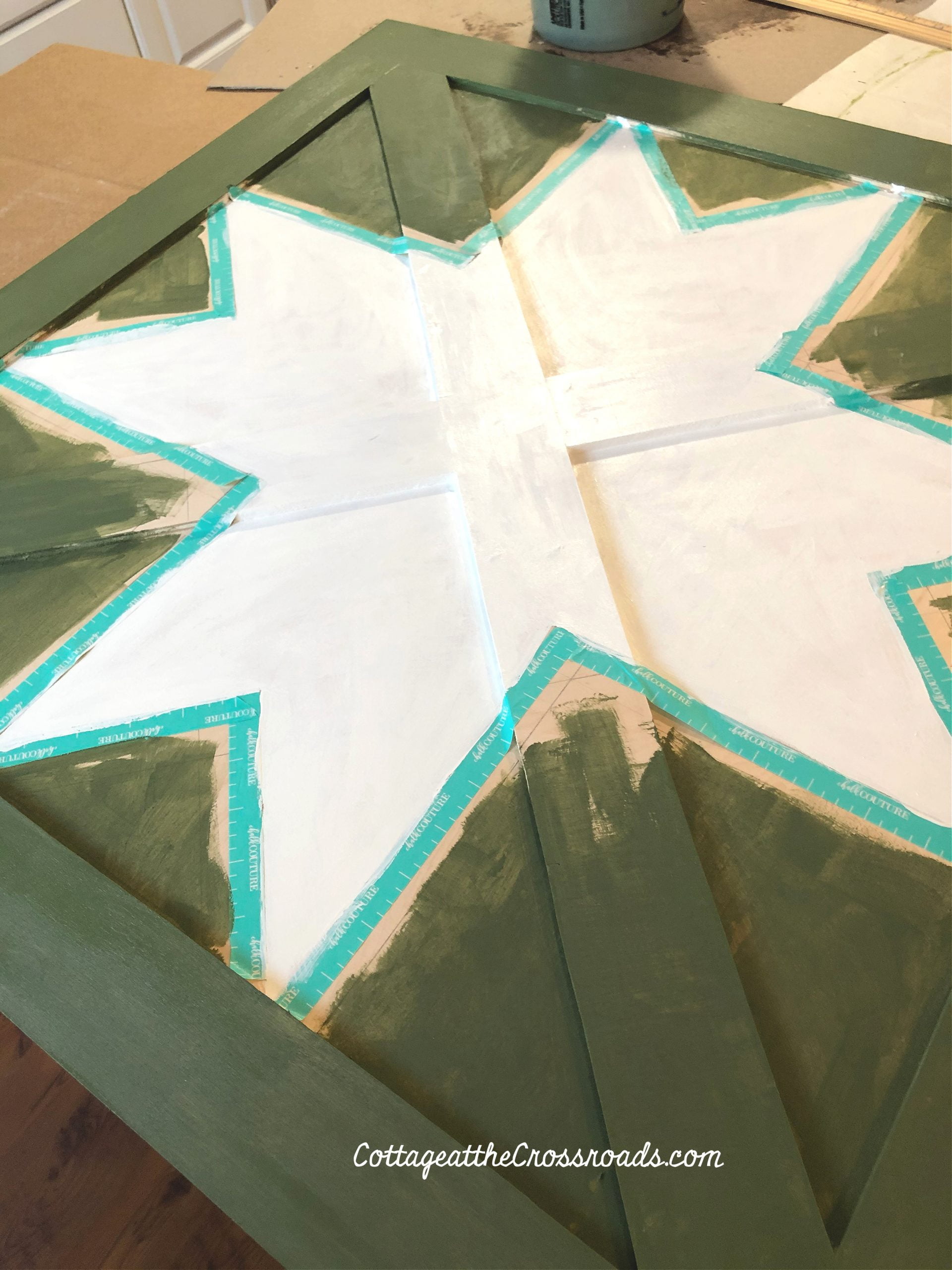 Painting a wooden barn star quilt