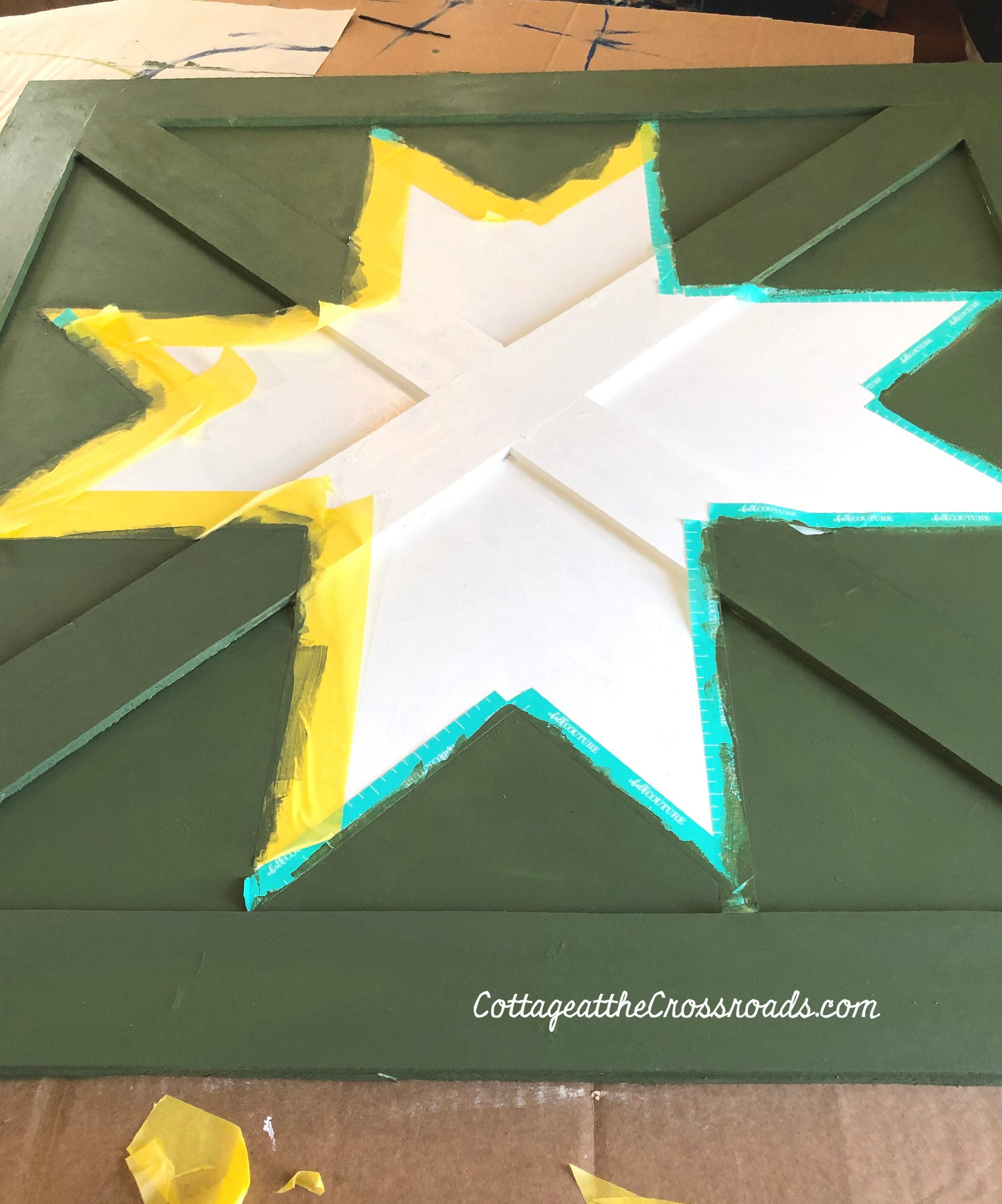 Painting a wooden barn star quilt