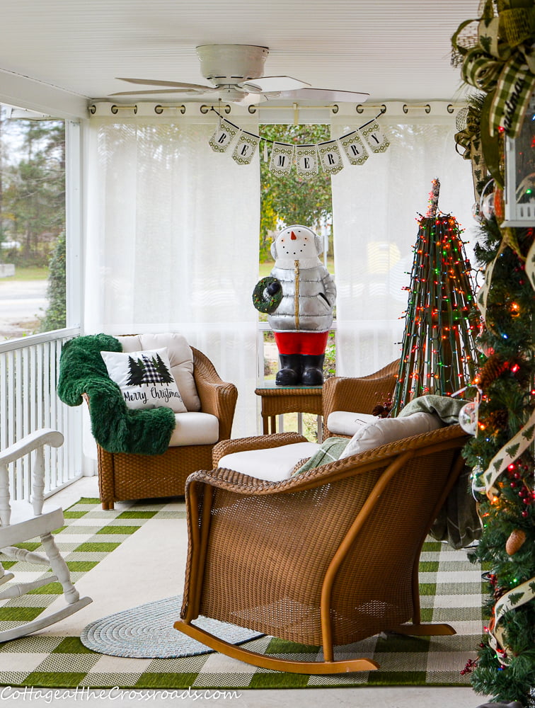 Sitting area of a christmas front porch