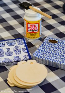 Supplies needed to make blue and white ornaments
