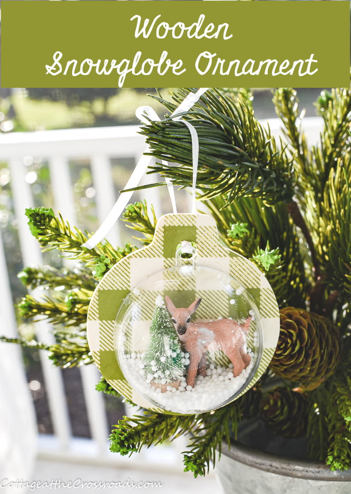 Wooden snow globe ornament graphic