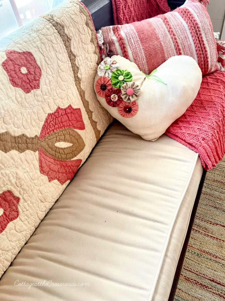 Church pew with heart shaped pillow