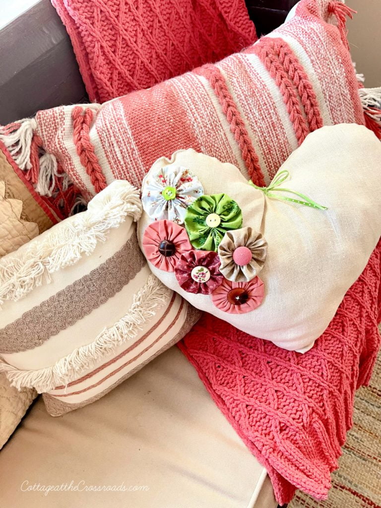 Heart shaped pillow with yo-yos