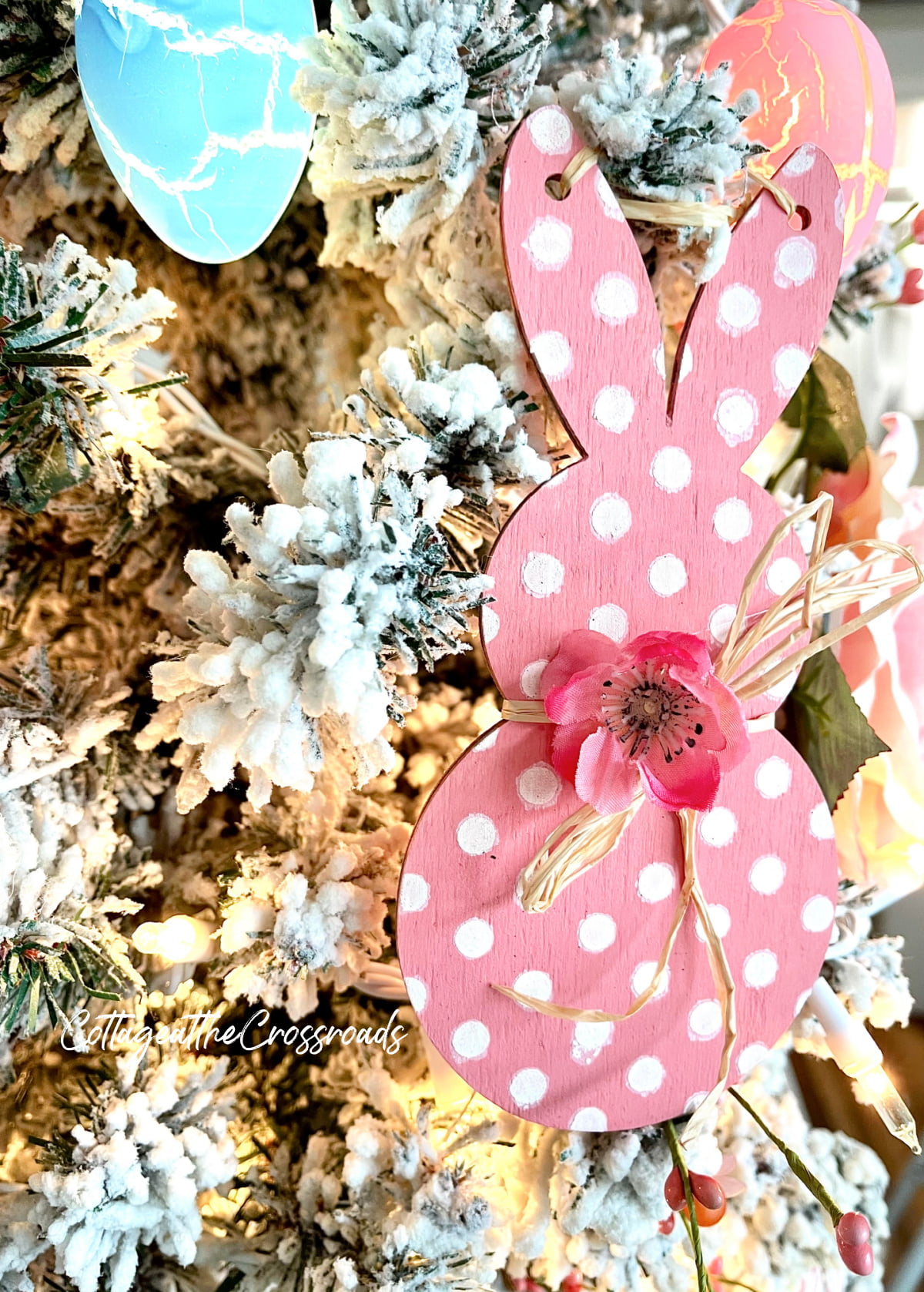 Polka dot wooden bunny on a easter tree