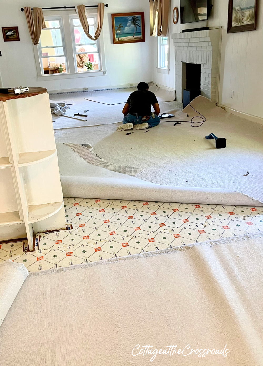 https://cottageatthecrossroads.com/wp-content/uploads/2021/04/carpet-being-installed-1.jpg