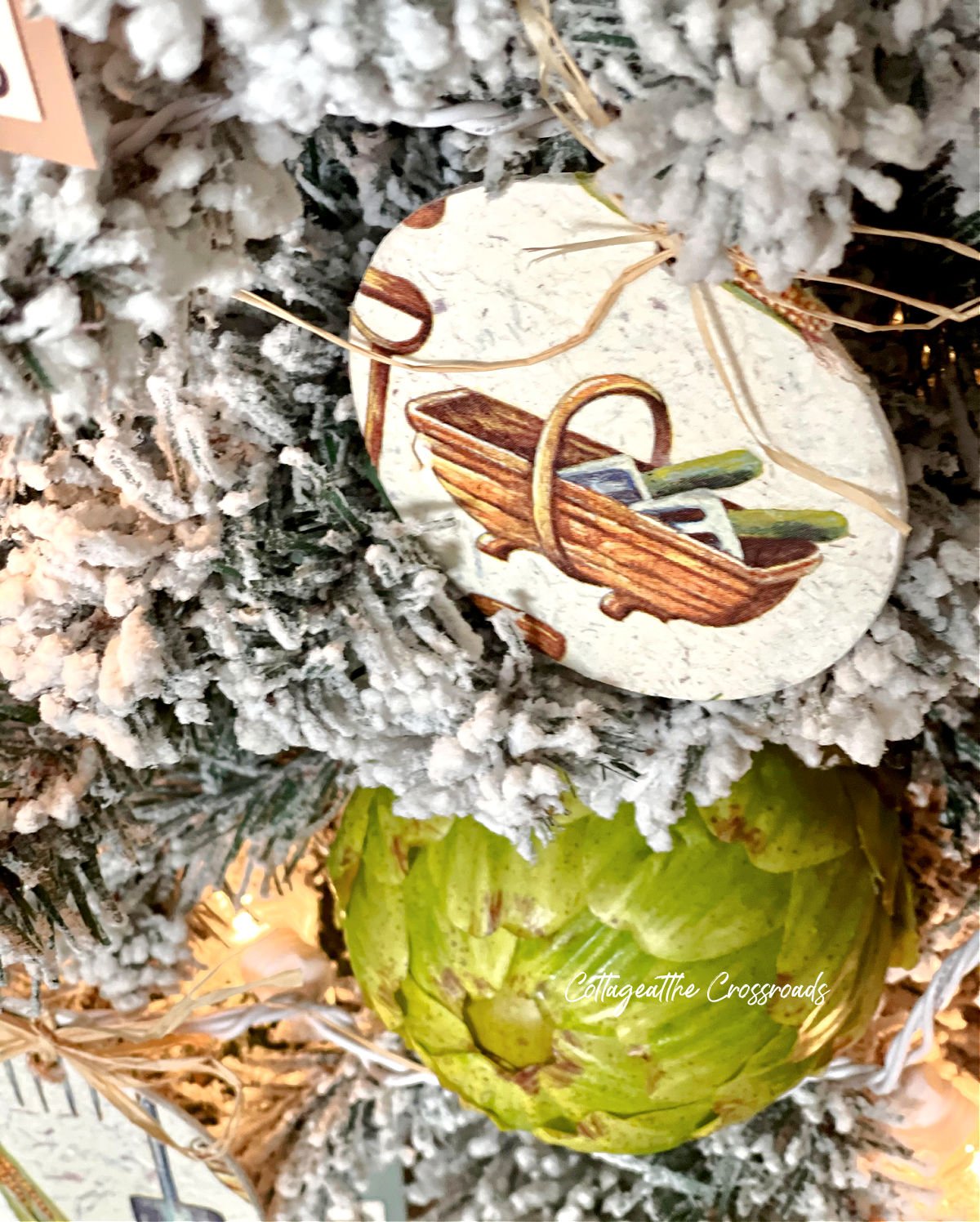 Decoupaged round garden theme ornament