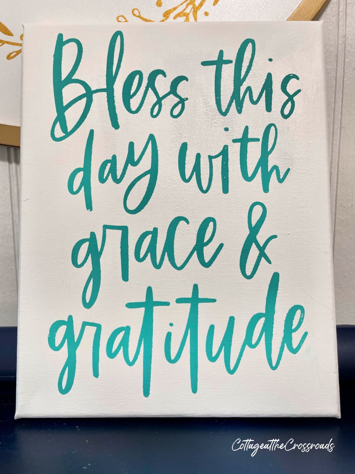 Sign saying bless this day with grace and gratitude