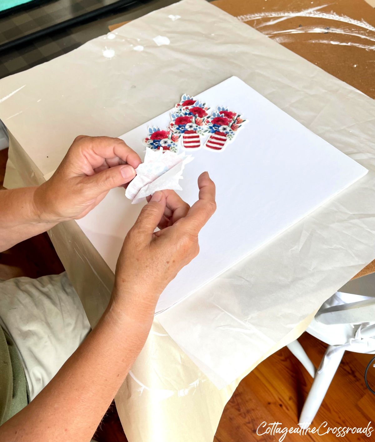 Separating the layers of cut out napkins